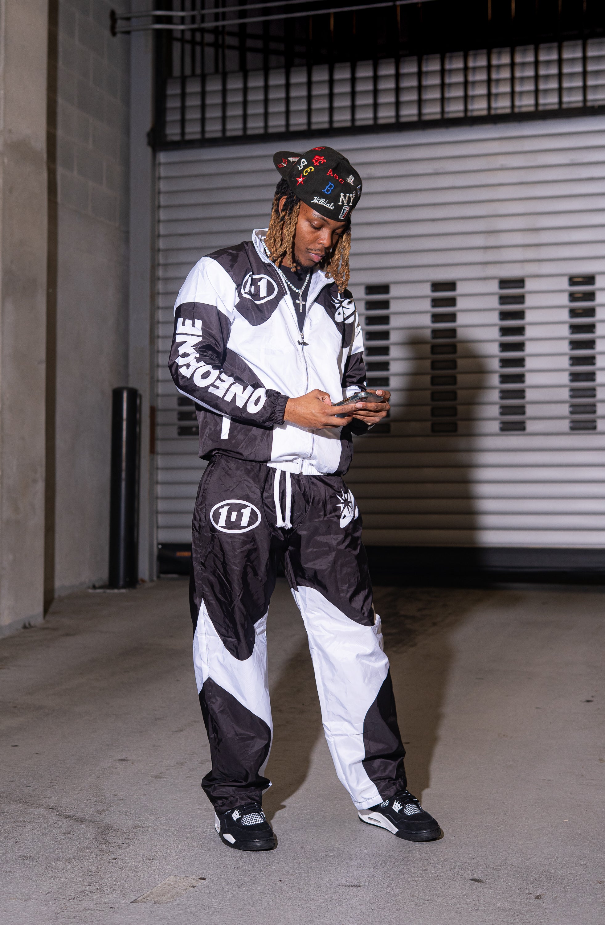 “ONEOFONE” BLACK WINDBREAKER SET